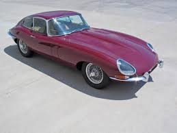 Image result for Maroon 1962 Jaguar