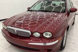 Image result for Persian Red Pearl 2008 Jaguar