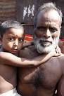 man and boy hanging round