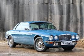 Image result for Carriage Brown 1977 Jaguar