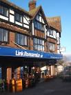 Link Romania charity store. In a distinctive building on the parade of shops - via Daymix