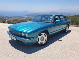 Image result for Bright Turquoise 1995 Jaguar