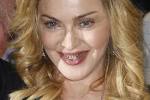 Madonna-shows-her-grills-as-.