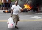 Public Emergency Declared After Baltimore Rioters Burn Police Cars.