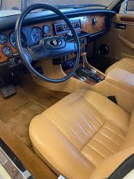 Image result for Nimbus White 1987 Jaguar