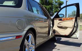 Image result for Winter Gold Pearl 2007 Jaguar
