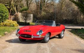 Image result for Maroon 1962 Jaguar