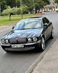 Image result for Black Cherry 2006 Jaguar
