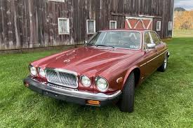 Image result for Sebring Red 1986 Jaguar