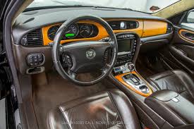 Image result for Black Cherry 2006 Jaguar