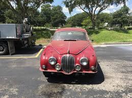 Image result for Maroon 1962 Jaguar