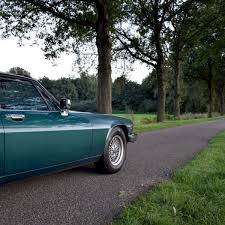 Image result for Poseidon Dark Green 1985 Jaguar