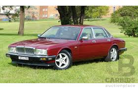 Image result for Bordeaux Red 1987 Jaguar