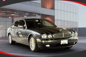 Image result for Black Cherry 2006 Jaguar