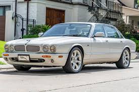 Image result for White Onyx 2002 Jaguar