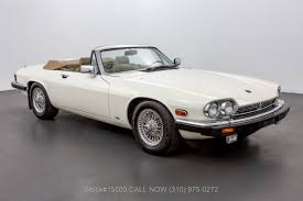 Image result for Nimbus White 1987 Jaguar