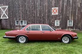 Image result for Sebring Red 1986 Jaguar