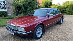 Image result for Grenadier Red 1987 Jaguar