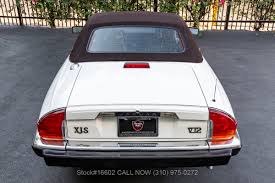 Image result for Glacier White 1989 Jaguar