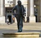 Statue of Prime Minister Harold Wilson outside Huddersfield Station. - via Daymix