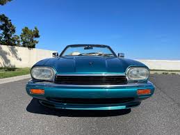 Image result for Bright Turquoise 1995 Jaguar