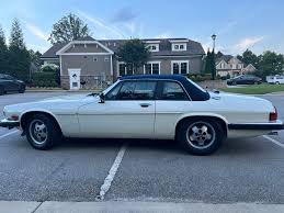 Image result for Glacier White 1988 Jaguar