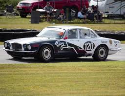 Image result for Sebring Red 1986 Jaguar