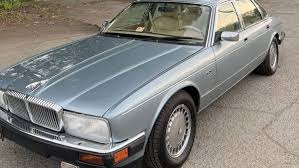 Image result for New Glacier White 1991 Jaguar