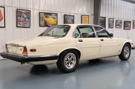 Image result for Nimbus White 1987 Jaguar