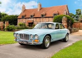 Image result for Light Blue 1973 Jaguar