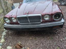 Image result for Burgundy 1983 Jaguar