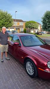 Image result for Maroon 1962 Jaguar