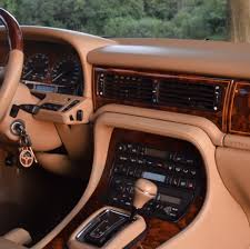 Image result for Carriage Brown 1977 Jaguar