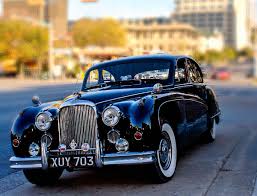 Image result for Silver Blue 1959 Jaguar