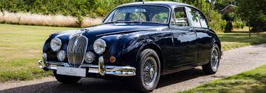 Image result for Dark Blue 1965 Jaguar