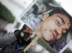 Tunisia cries as he holds