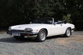 Image result for Glacier White 1988 Jaguar