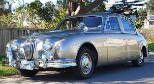 Image result for Silver Blue 1959 Jaguar