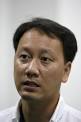 Former French Open champion Michael Chang speaks with the media at Qi Zhong ... - xin_44030420083500500541