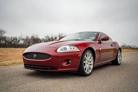 Image result for Persian Red Pearl 2008 Jaguar