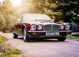 Image result for Burgundy 1983 Jaguar