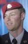 Staff Sergeant Zachary Rhyner receives the Air Force Cross and the Purple