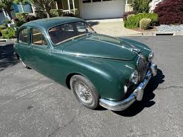 Image result for Dark Green 1959 Jaguar