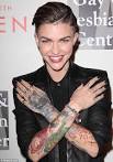RUBY ROSE cosies up to fiancee Phoebe Dahl and actress Evan Rachel.