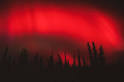 Red aurora borealis over