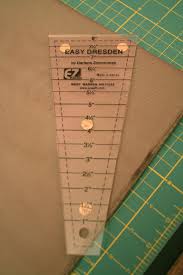 The first step to making a dresden block is to get your hands on an EZ Quilting “Easy Dresden” ruler. We sell them in our shop and online store. - 1-ruler