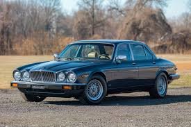 Image result for Burgundy 1983 Jaguar
