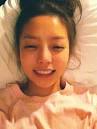 her bare face in. KARA's