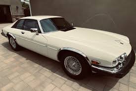 Image result for Nimbus White 1987 Jaguar