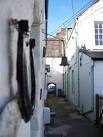 View in direction of High Street from The doorway of Gable Cottage. - via Daymix